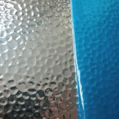 Des feuilles d'aluminium réfléchissantes en miroir Stucco Hammer Pebble en relief de 200 mm